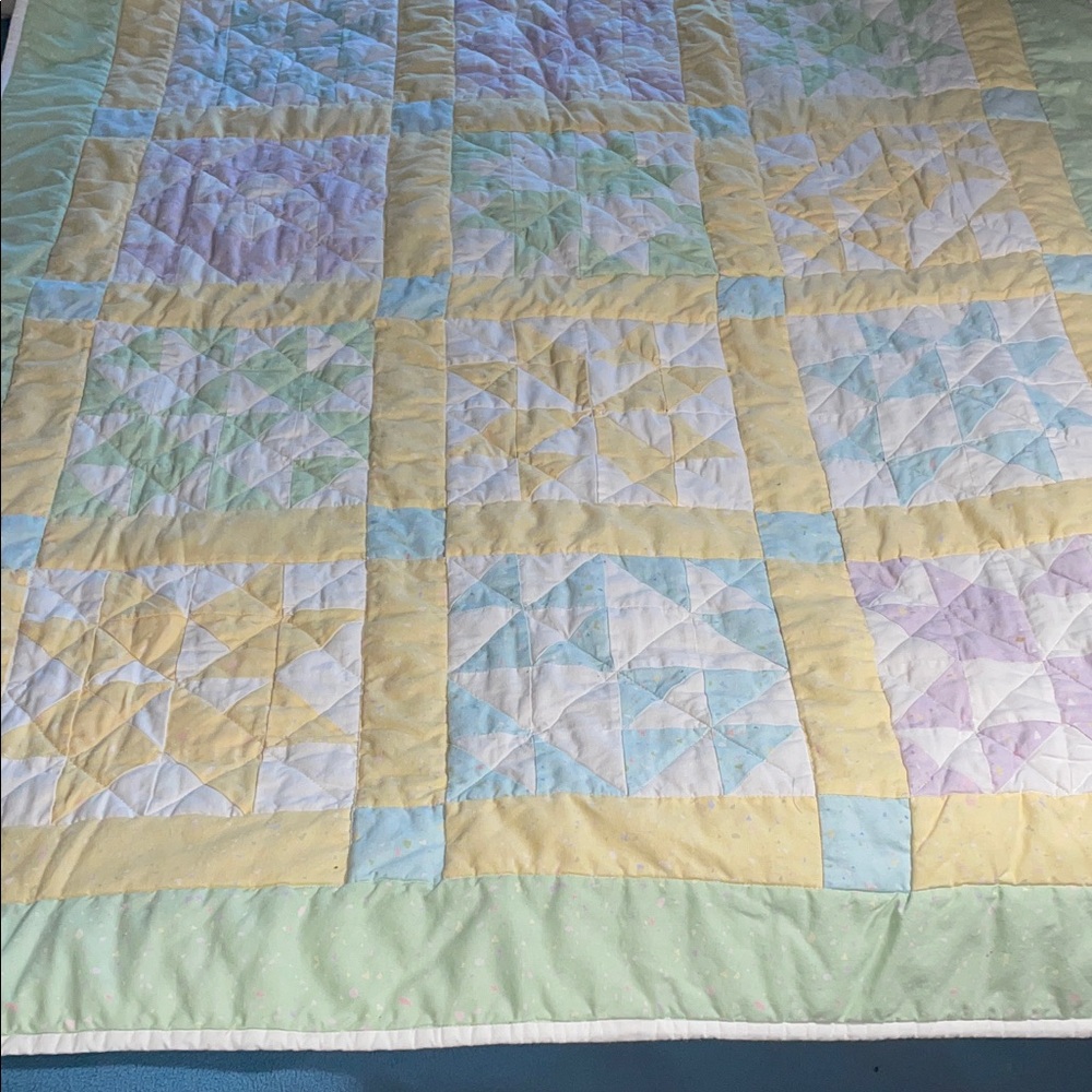 Handmade child-size pastel quilt-approximately 41” x 51”